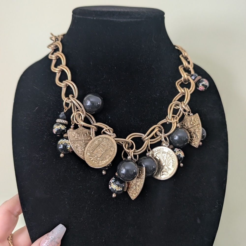 Gold and Black Coin And Shield Charm Necklace